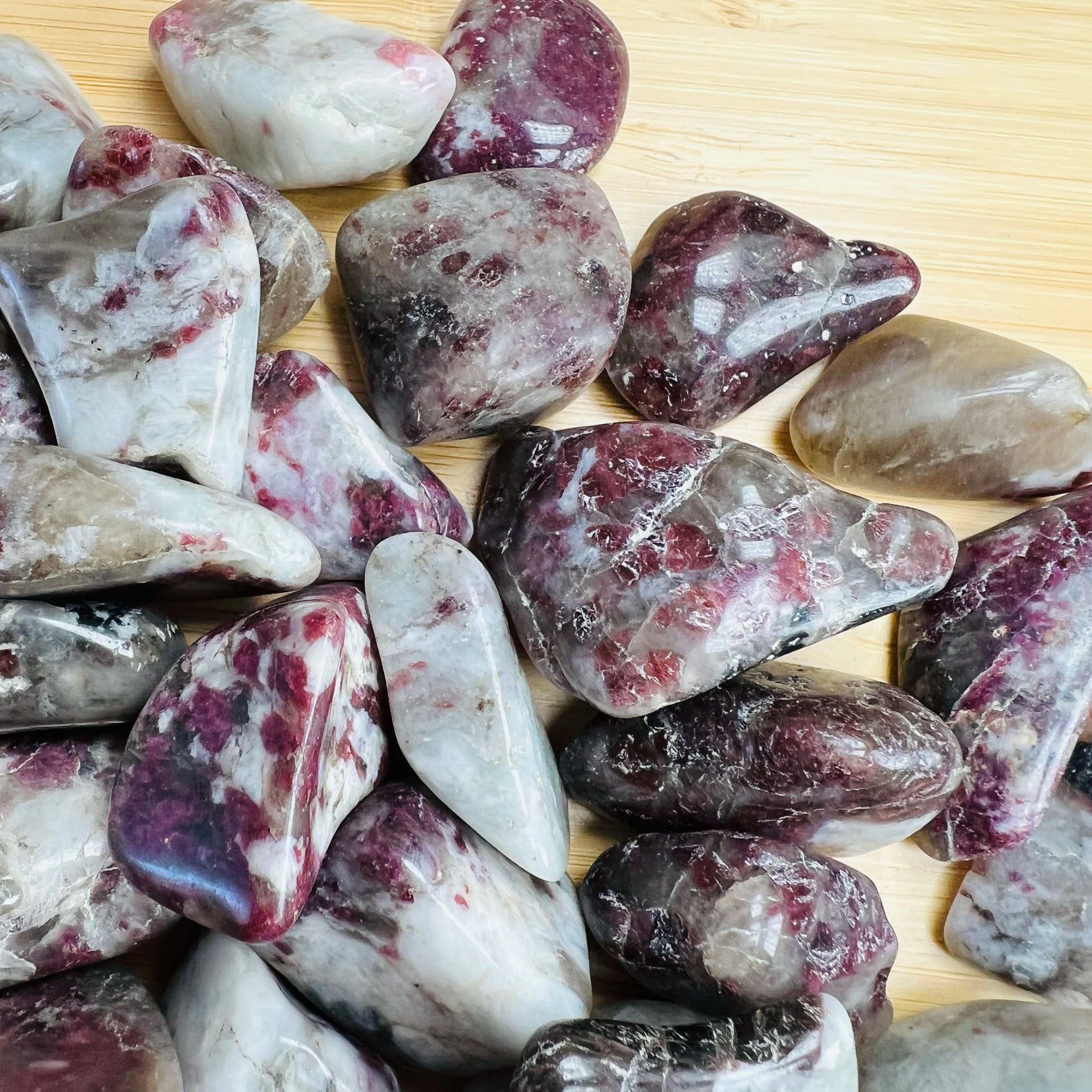Underside detail of Pink Tourmaline tumbled stone, from Madagascar, associated with Love.