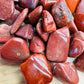 Tight crop of Red Jasper tumbled stone, sourced from Madagascar.