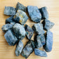 Macro view of Labradorite raw stone, hand-selected from Atsimo-Andrefana, Madagascar, associated with Intuition and Protection.