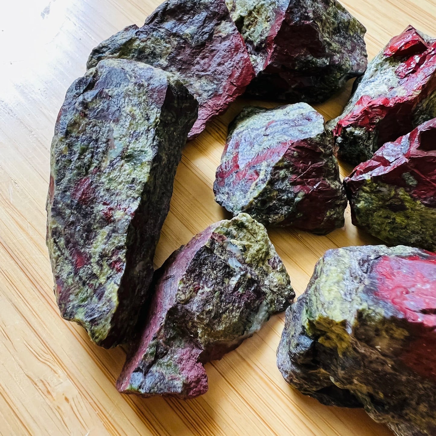 Top-side view of green Dragon Bloodstone raw stone, to support Confidence and Energy.