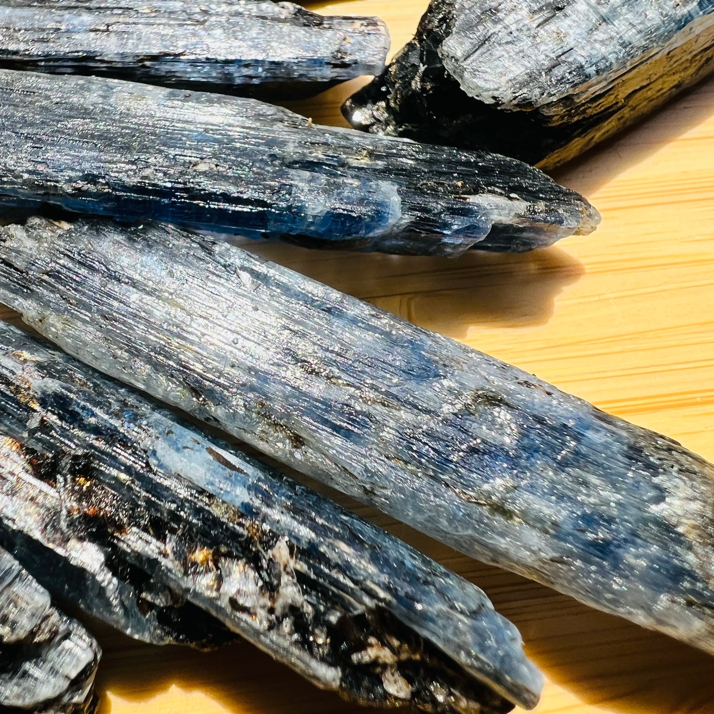 Detail shot of Grade AA Blue Kyanite raw under natural light