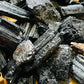 Full profile of Grade AA Black Tourmaline raw ready to ship from Beyond Bohemian