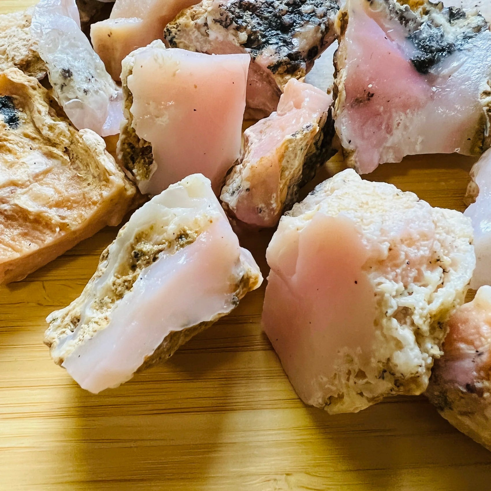 Close-up of Pink Opal raw stone from Peru, soothing wellness stone for Emotional Healing