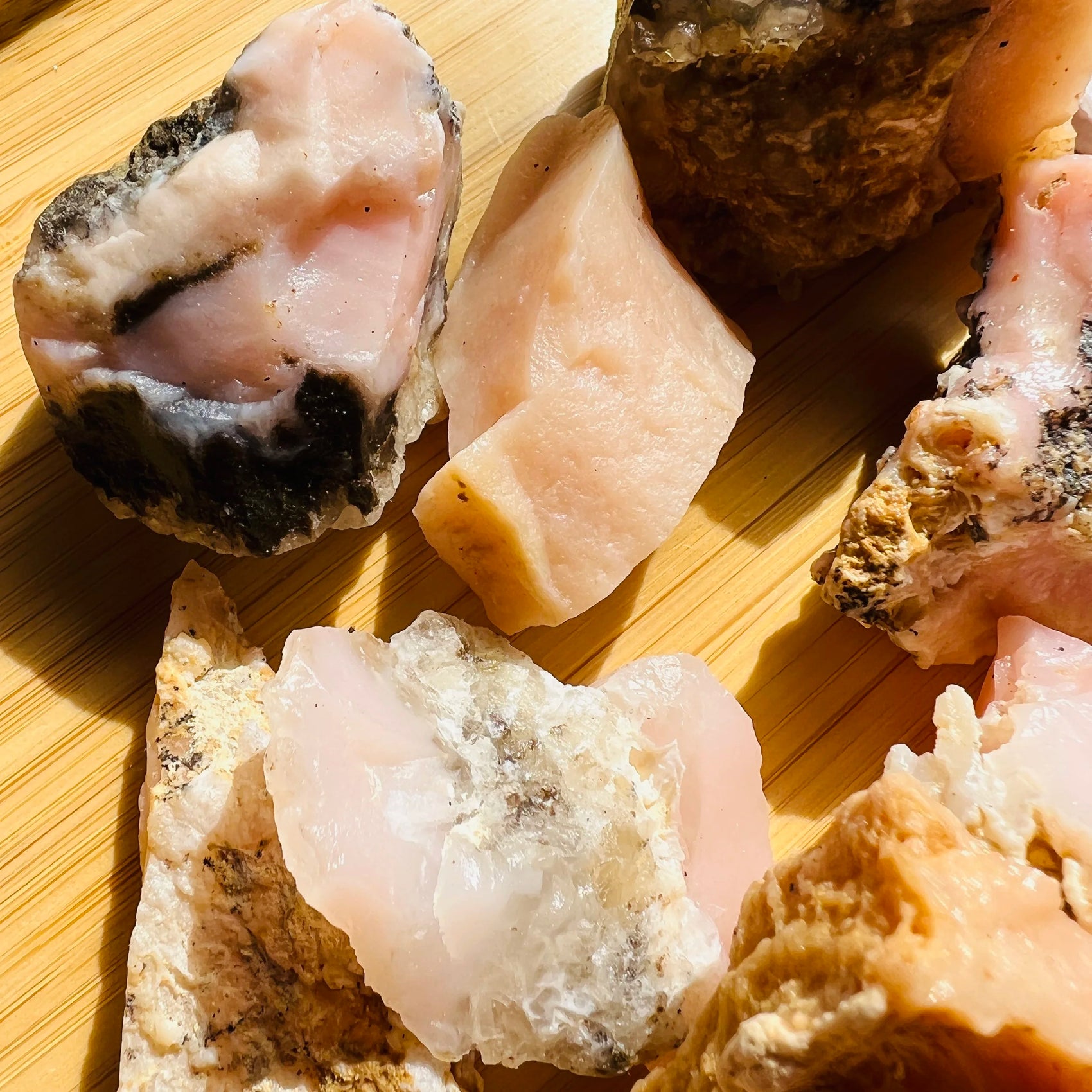 Close-up of Pink Opal raw stone from Peru, soothing wellness stone for Emotional Healing