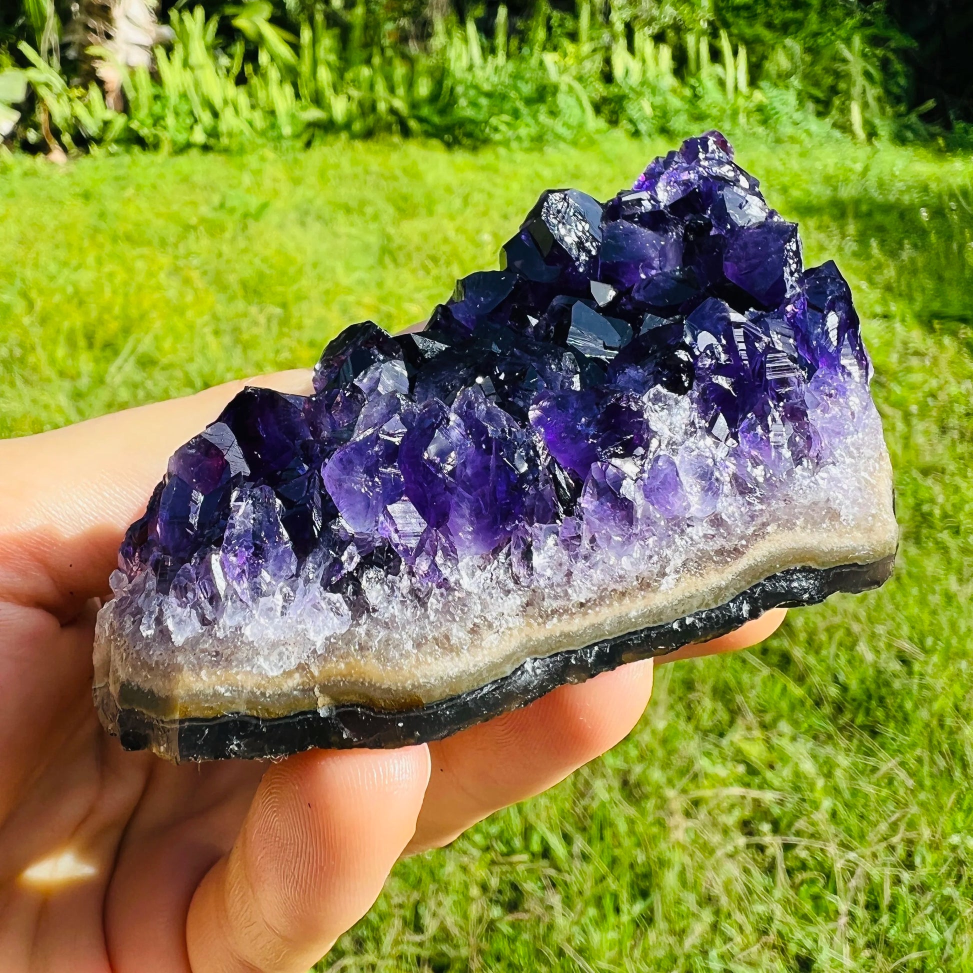 Profile view of Amethyst specimen, hand-selected from Artigas, Uruguay, kept near for Stress Relief.