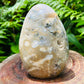 Top angle of green Ocean Jasper freeform, showing earthy tone, Madagascar-sourced.