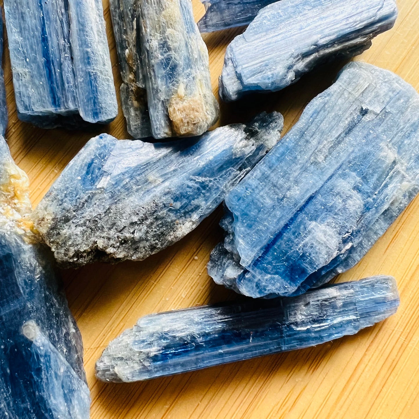 Top angle of Blue Kyanite raw stone, showing open form, traditionally used for Confidence.