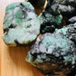 Lifestyle context of Emerald raw crystal, captured in soft, even lighting.