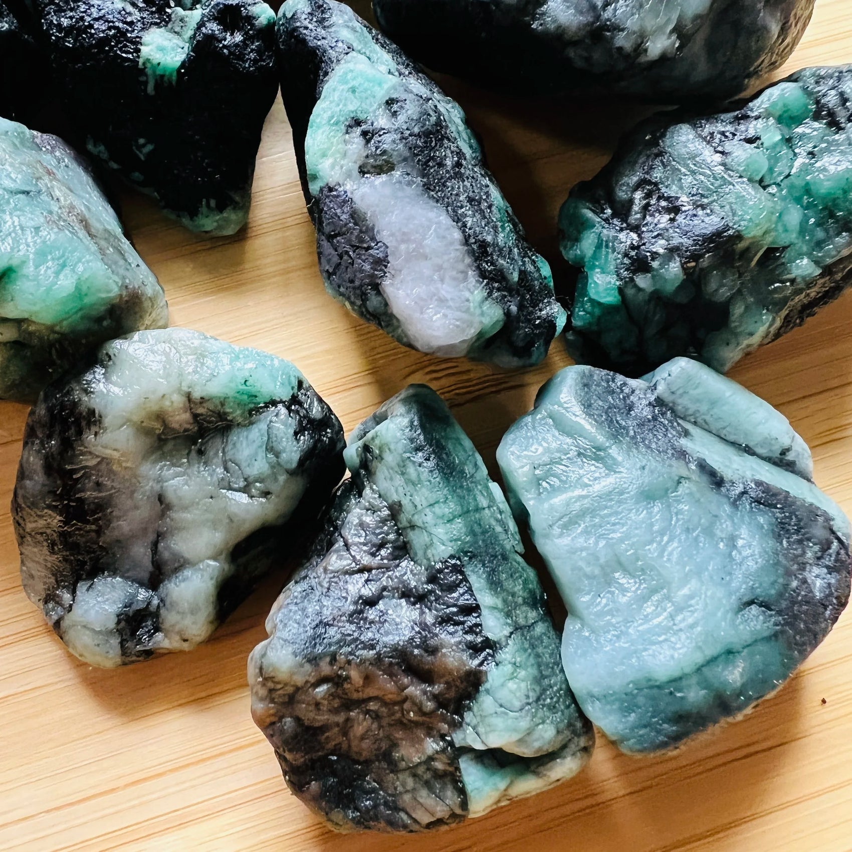 Back view of Grade A Emerald raw showing natural surface