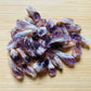 Looking down on purple Amethyst raw point, sourced from Southern Province, Zambia.