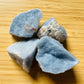 Back view of Grade A Angelite raw showing natural surface