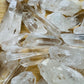 Detail shot of Grade AA Lemurian Quartz point under natural light