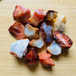 Grade aa carnelian raw held in hand for size reference