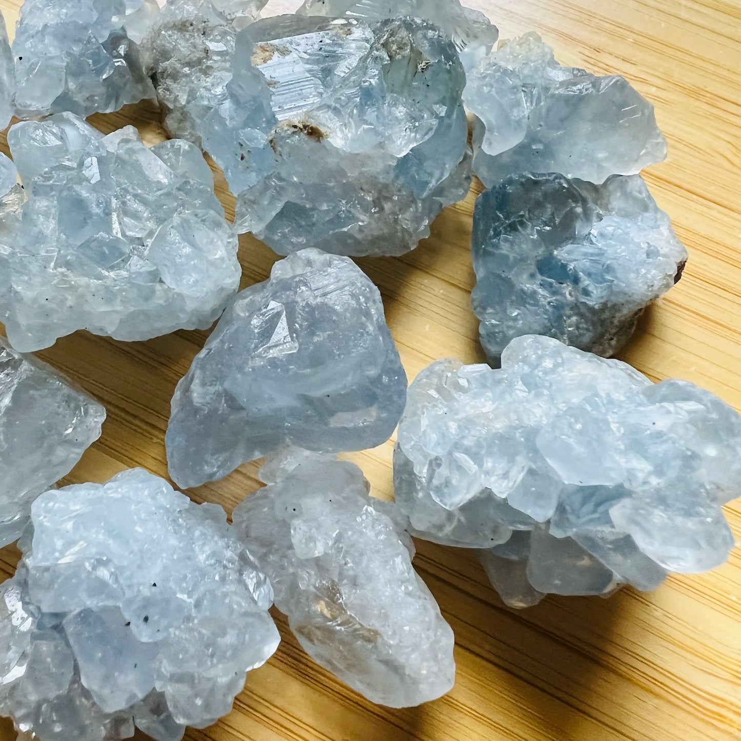 Edge-on view of Celestite raw stone, showing natural banding.