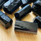 Full profile of Grade A Black Tourmaline raw ready to ship from Beyond Bohemian