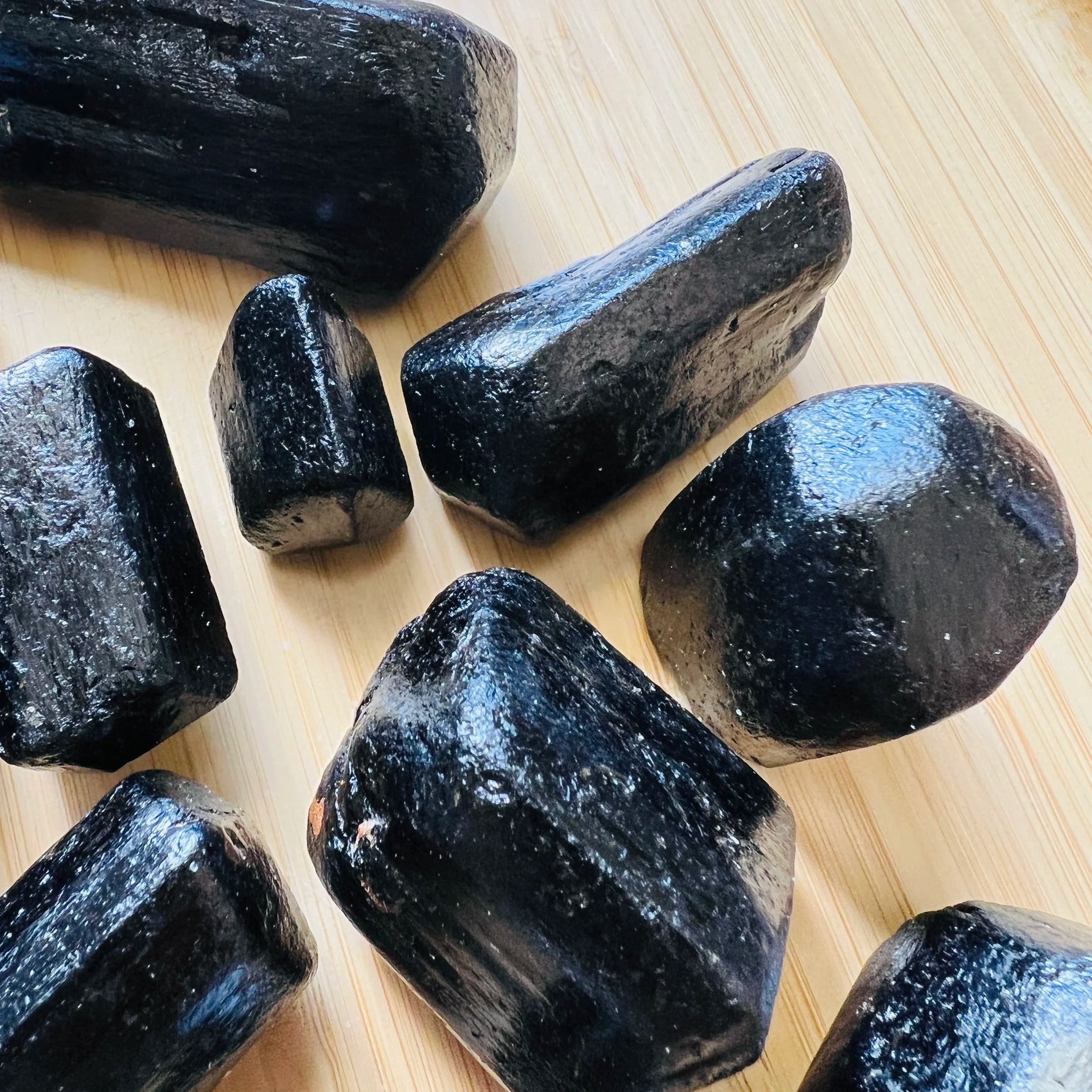 Black Tourmaline raw crystal from Zimbabwe with Black color, polished finish for mindful calm