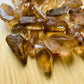 Magnified detail of Natural Citrine raw point, showing untreated character.