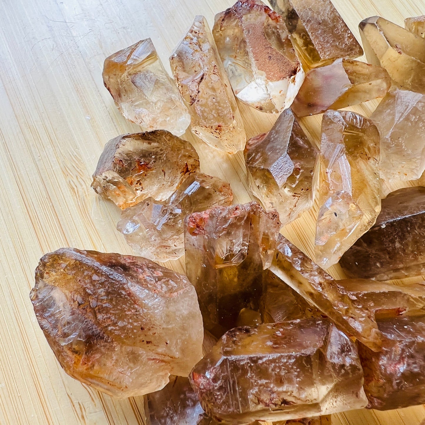 Profile shot of Natural Citrine raw point, showing natural form, from Minas Gerais, Brazil.