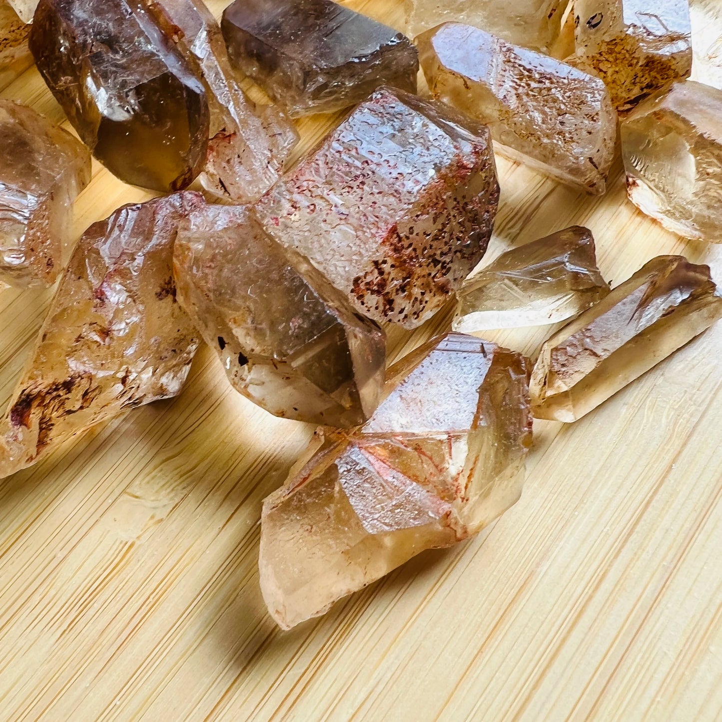 Opposite side of Natural Citrine raw point, showing characteristic color.
