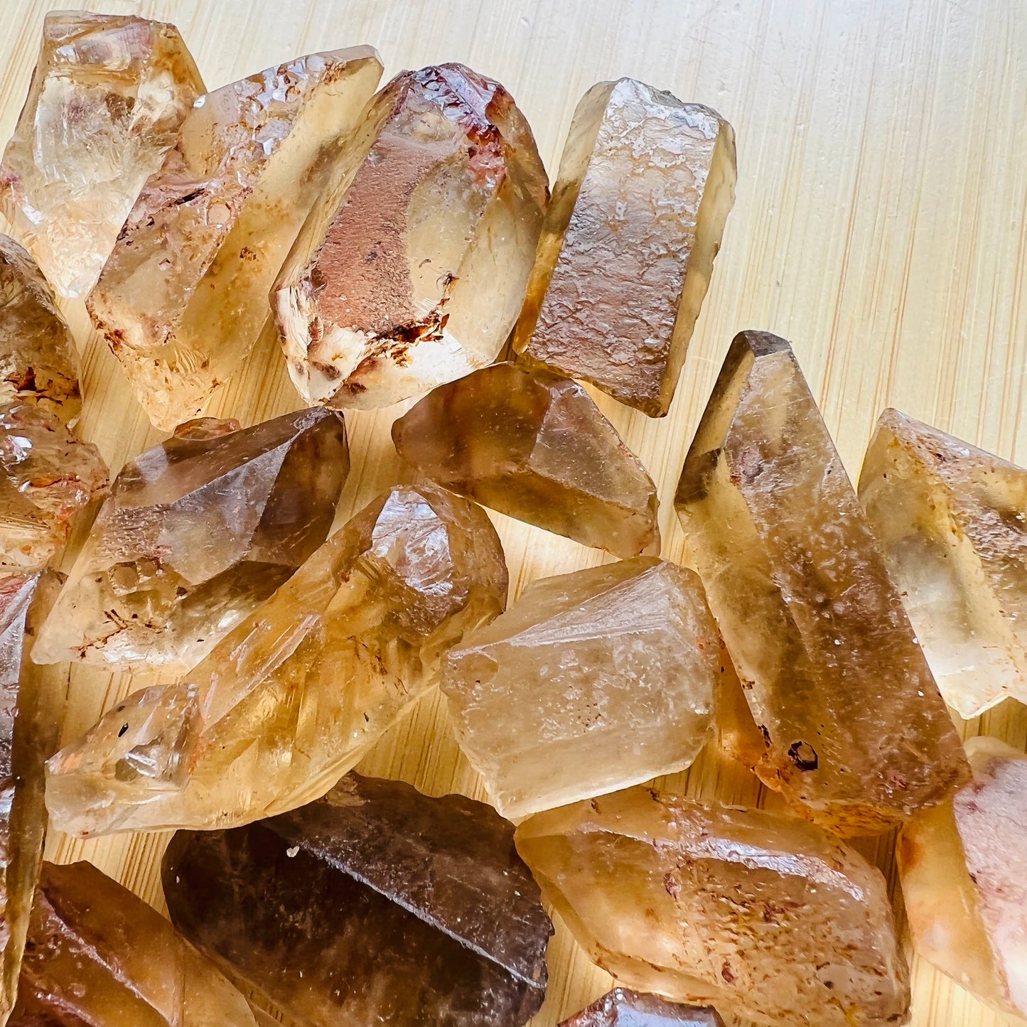 Top-down shot of Natural Citrine raw point, from Minas Gerais, Brazil, showing natural color depth.