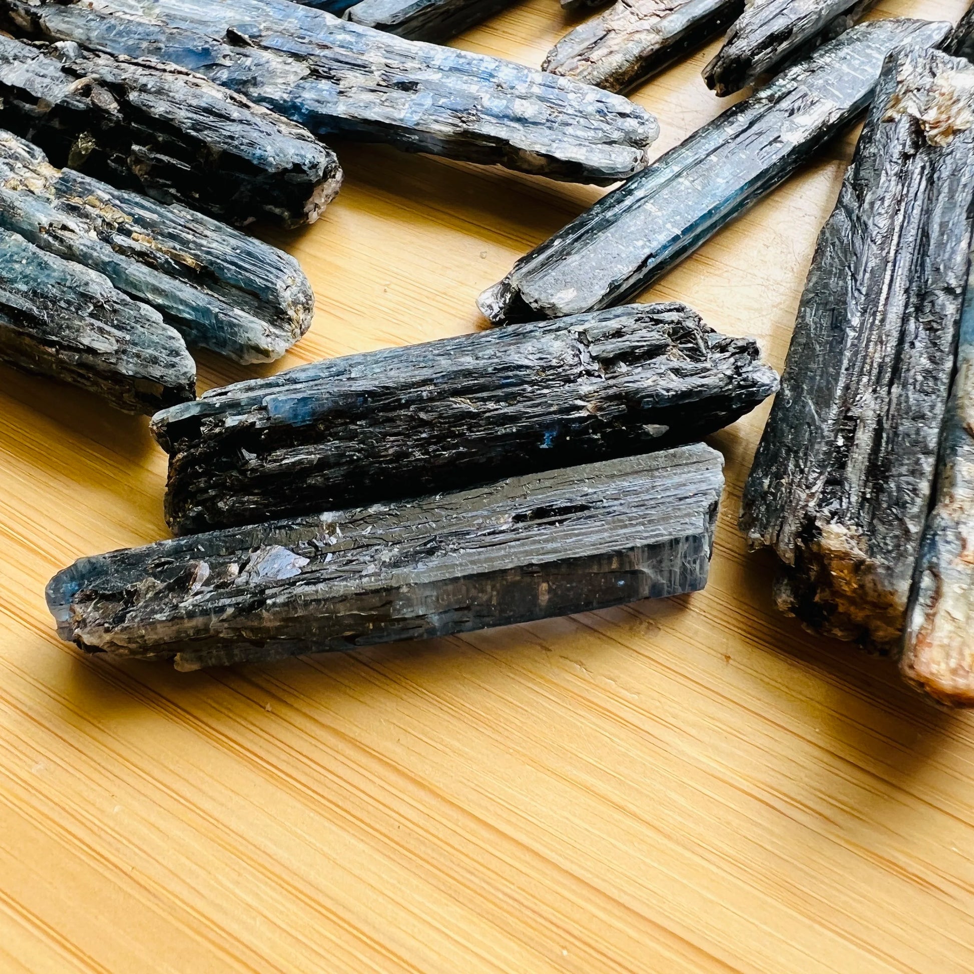 Daylight view of one Blue Kyanite raw stone for scale, sourced from Mashonaland West, Zimbabwe.