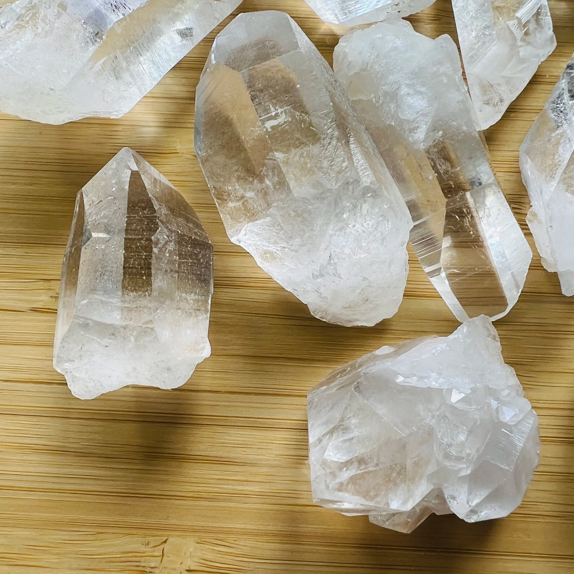 Bird's-eye view of Grade AAA Clear Quartz raw point, showing characteristic patterning, from United States.