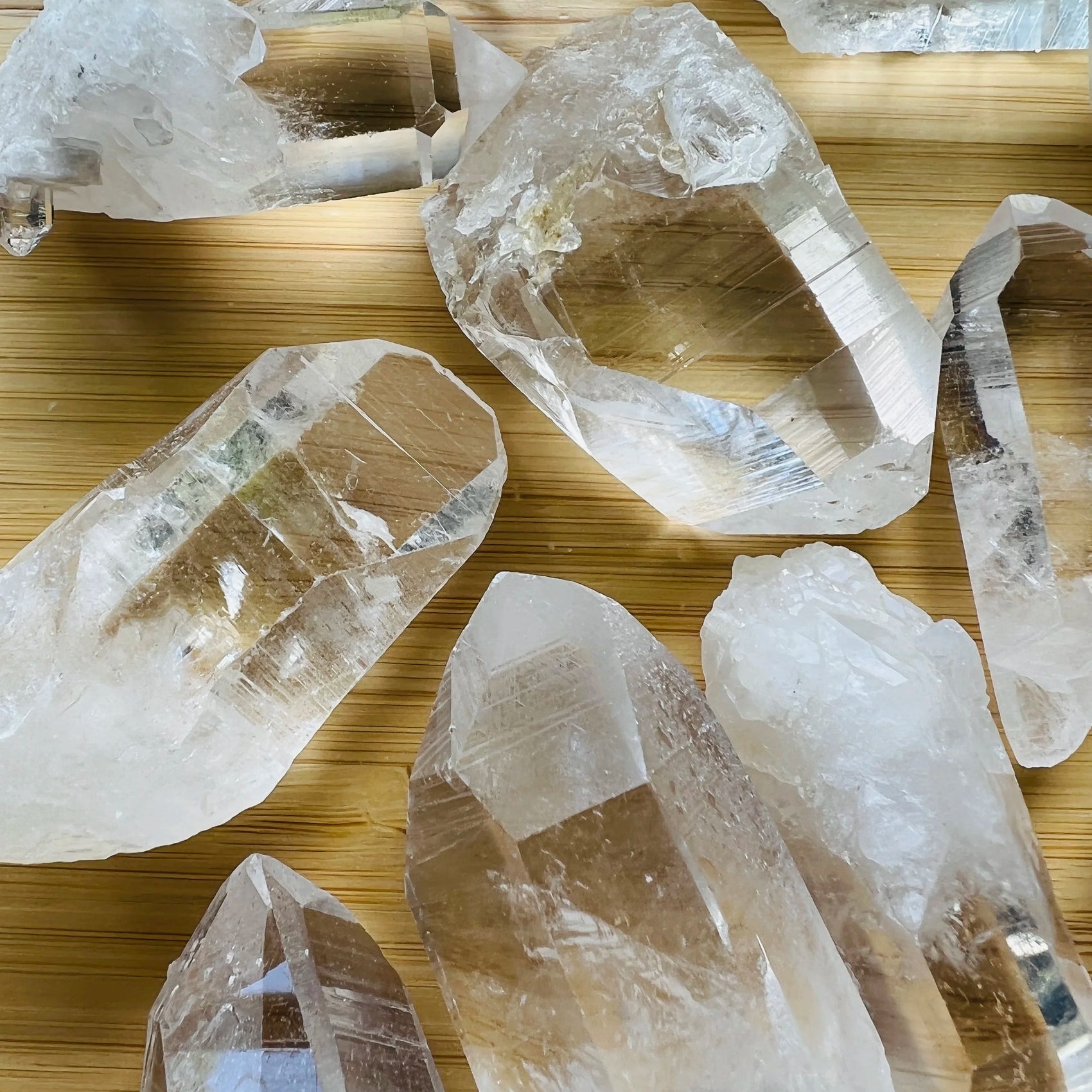 Alternate side of Clear Quartz raw point, showing natural texture.