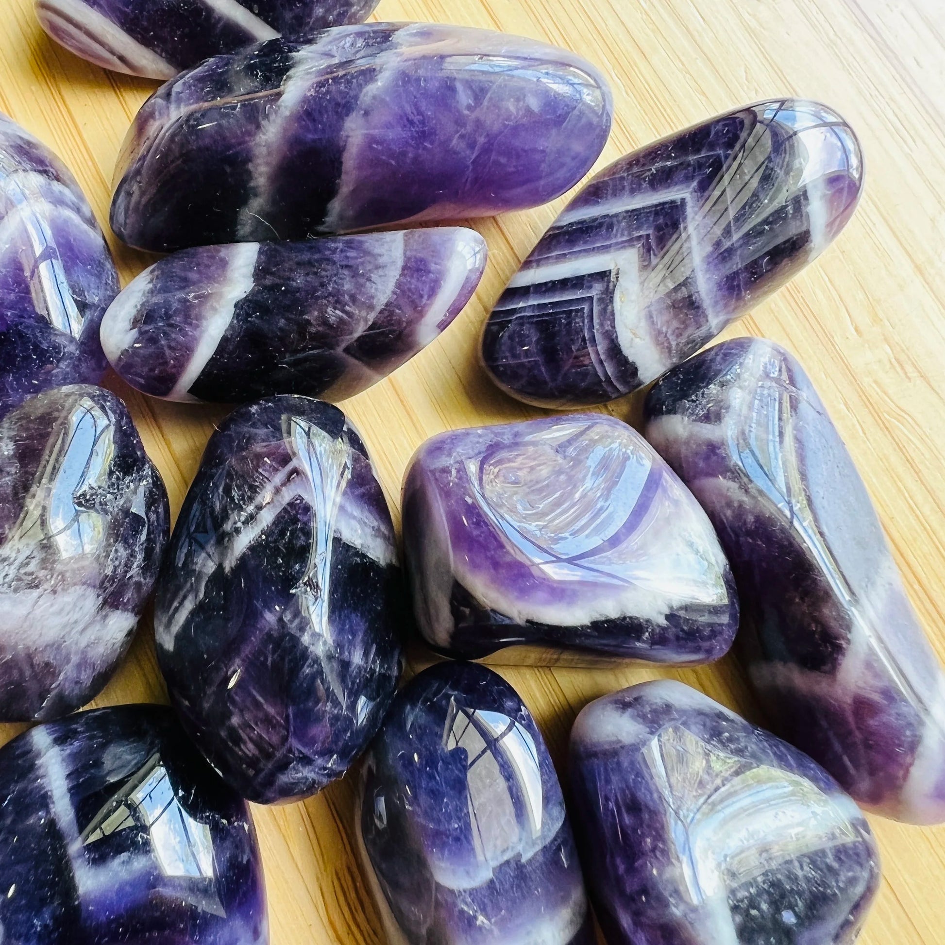 Opposite side of Chevron Amethyst tumbled stone, Zambia-sourced, carried for Intuition.