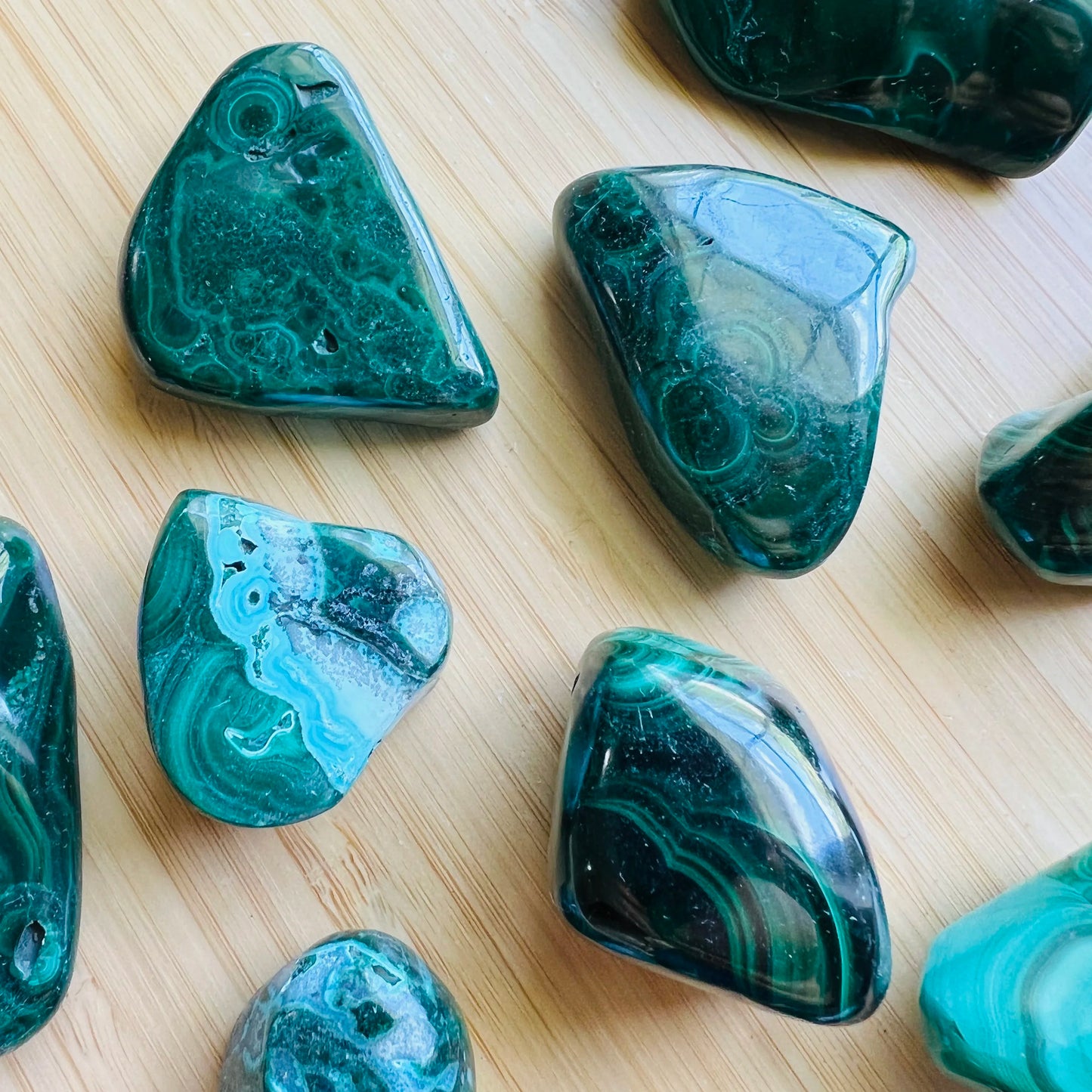 Full profile of Grade AA Malachite tumbled stone ready to ship from Beyond Bohemian