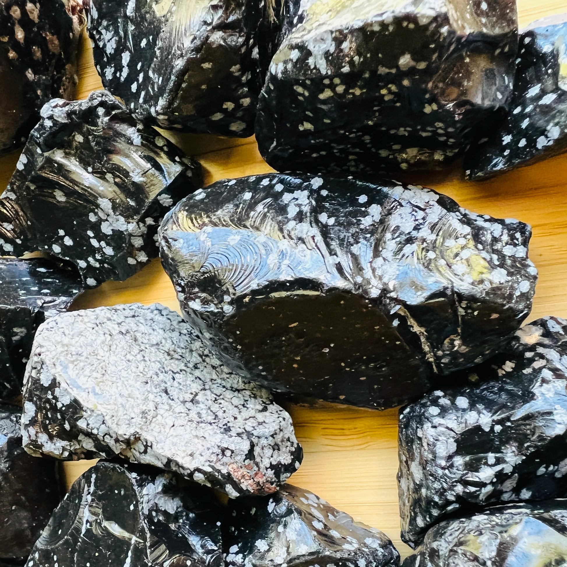 Reverse side of Snowflake Obsidian raw stone, hand-selected from Utah, United States, kept near for Grounding.