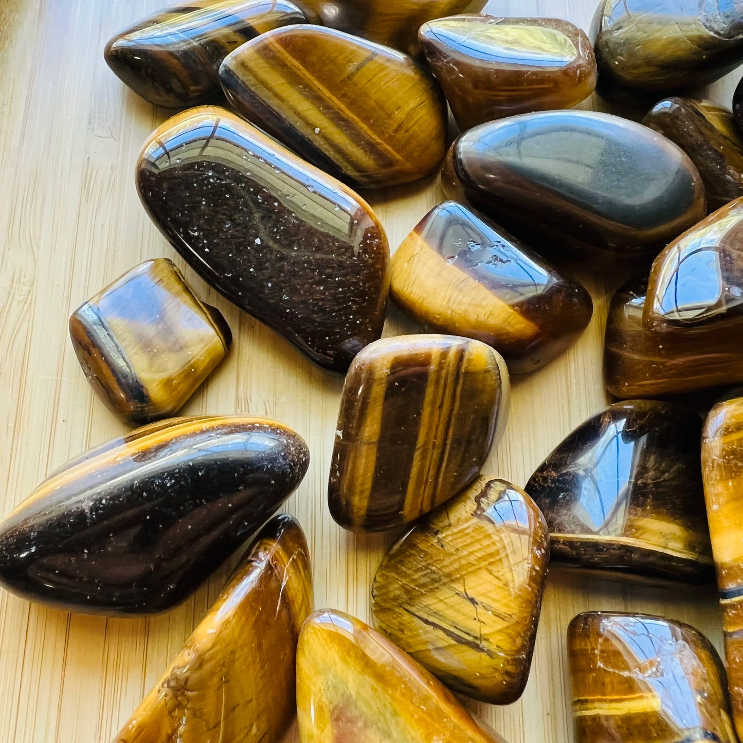 Full profile of Grade A Tiger Eye tumbled stone ready to ship from Beyond Bohemian