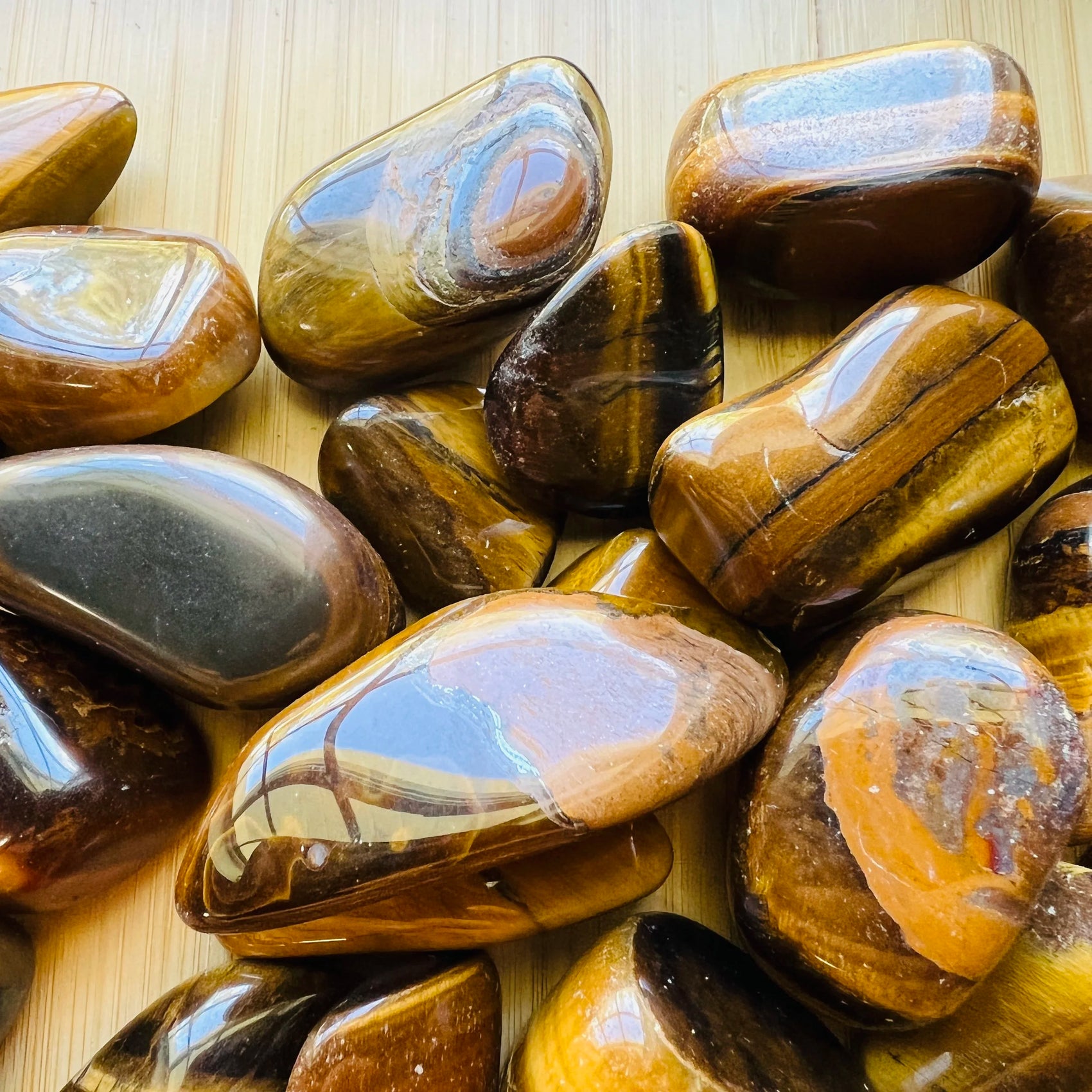 Tiger Eye tumbled stone in Brown, Gold tones from South Africa for Career and Protection