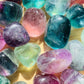 Grain detail of Grade AA Fluorite tumbled stone, often kept for Focus, showing characteristic color.