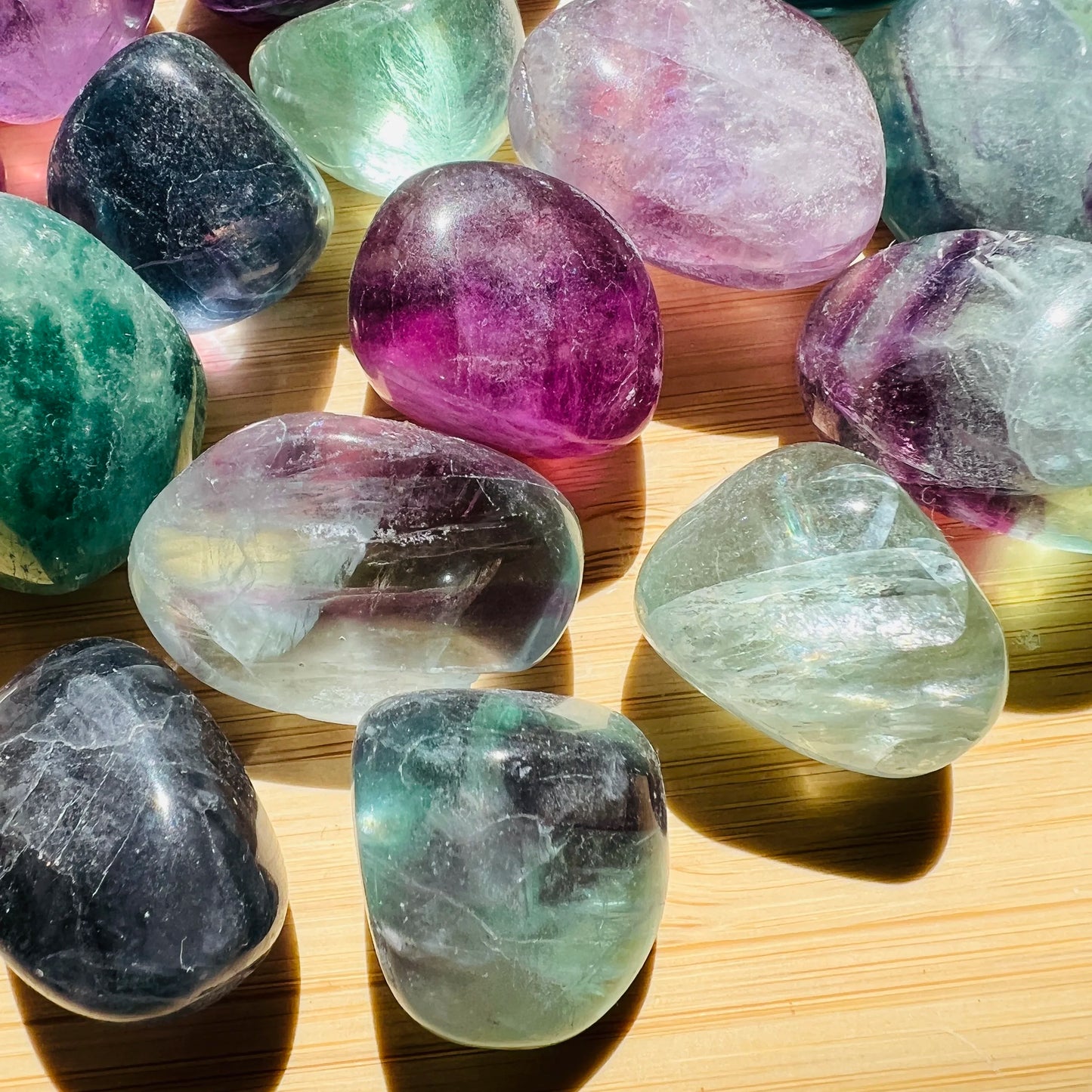 Soft-light view of Fluorite tumbled stone, from Jiangxi, China, with surface texture in view.