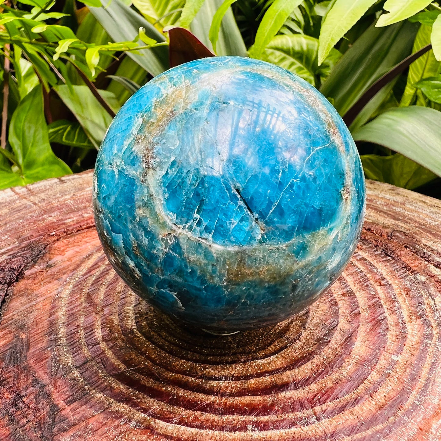 Back view of Grade AA Apatite sphere showing natural surface