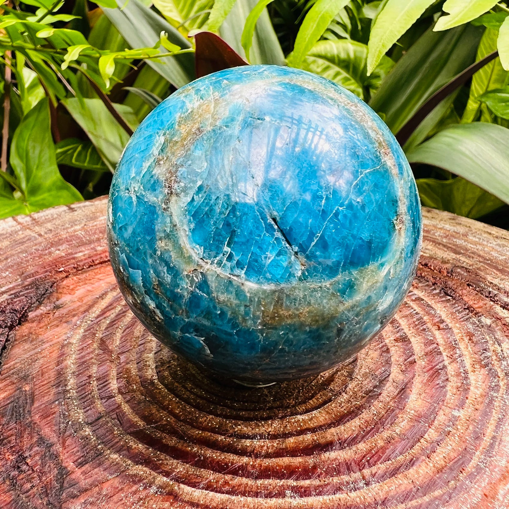 Back view of Grade AA Apatite sphere showing natural surface