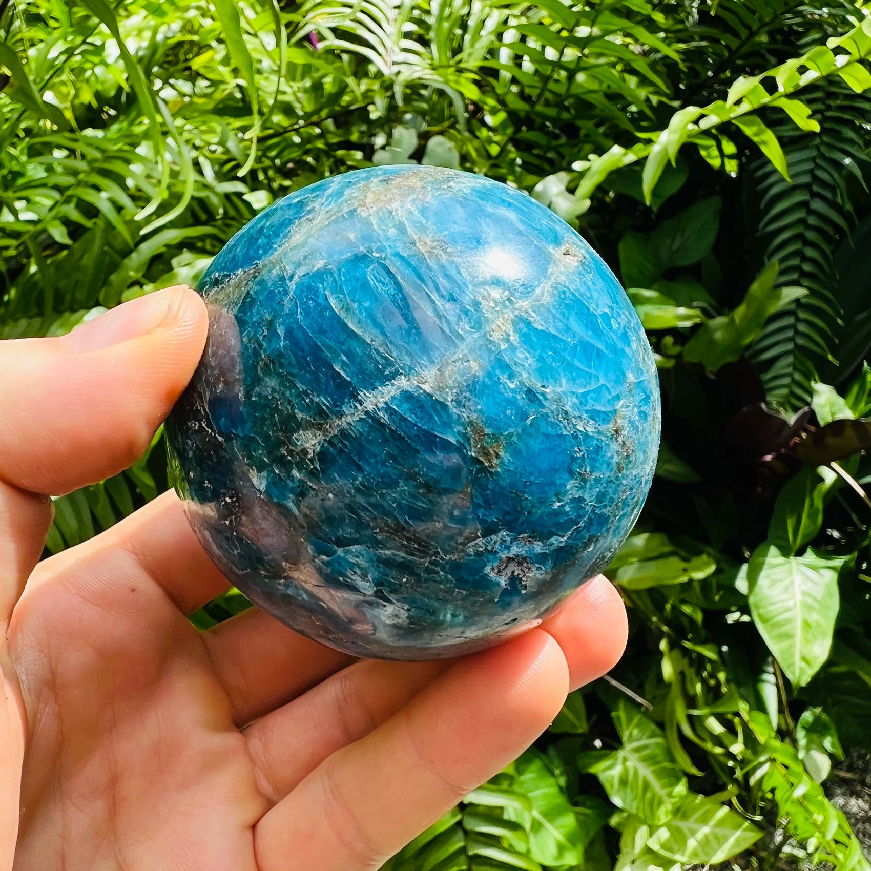 Looking down on Apatite polished sphere, from Madagascar, traditionally used for Focus.