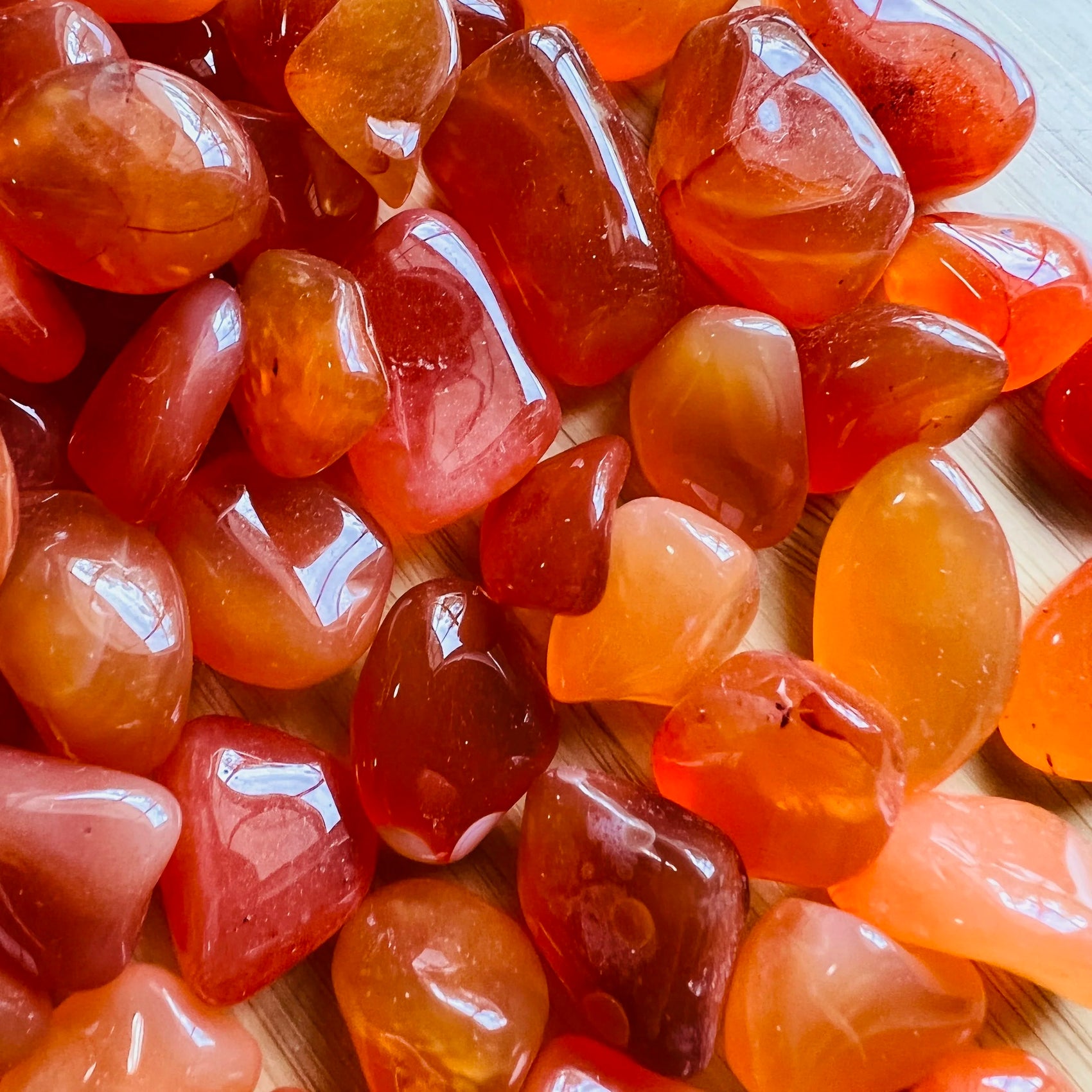Alternate side of Grade AA Carnelian tumbled stone, for Energy.