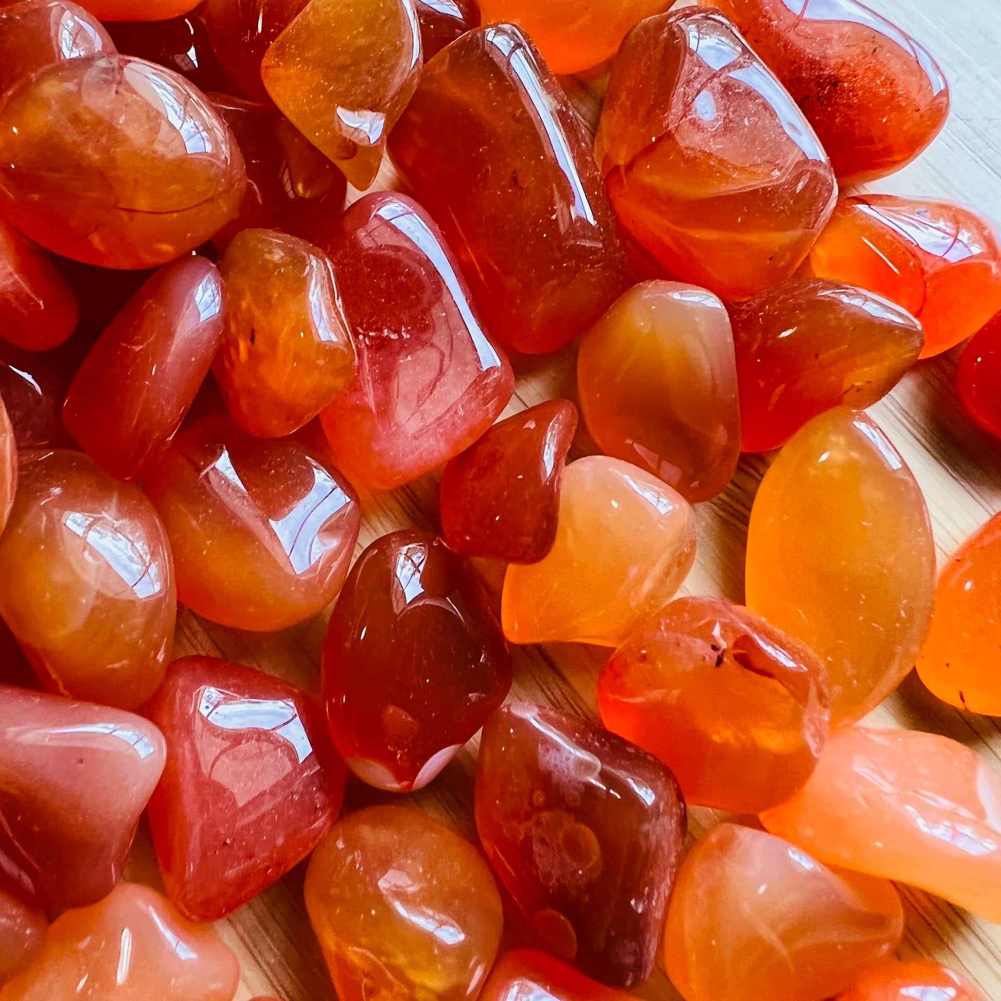 Alternate side of Grade AA Carnelian tumbled stone, for Energy.