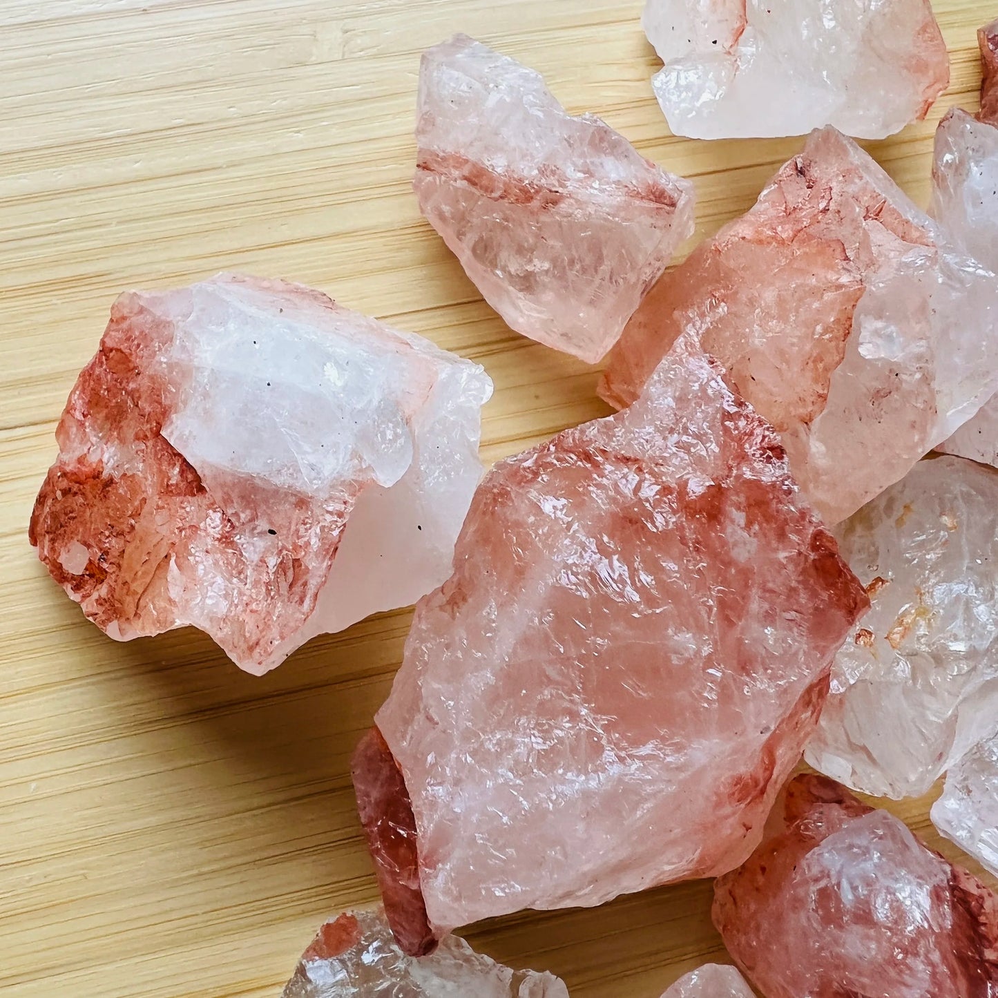 Texture-level view of red Fire Quartz raw stone, kept near for Grounding and Confidence, from Madagascar.