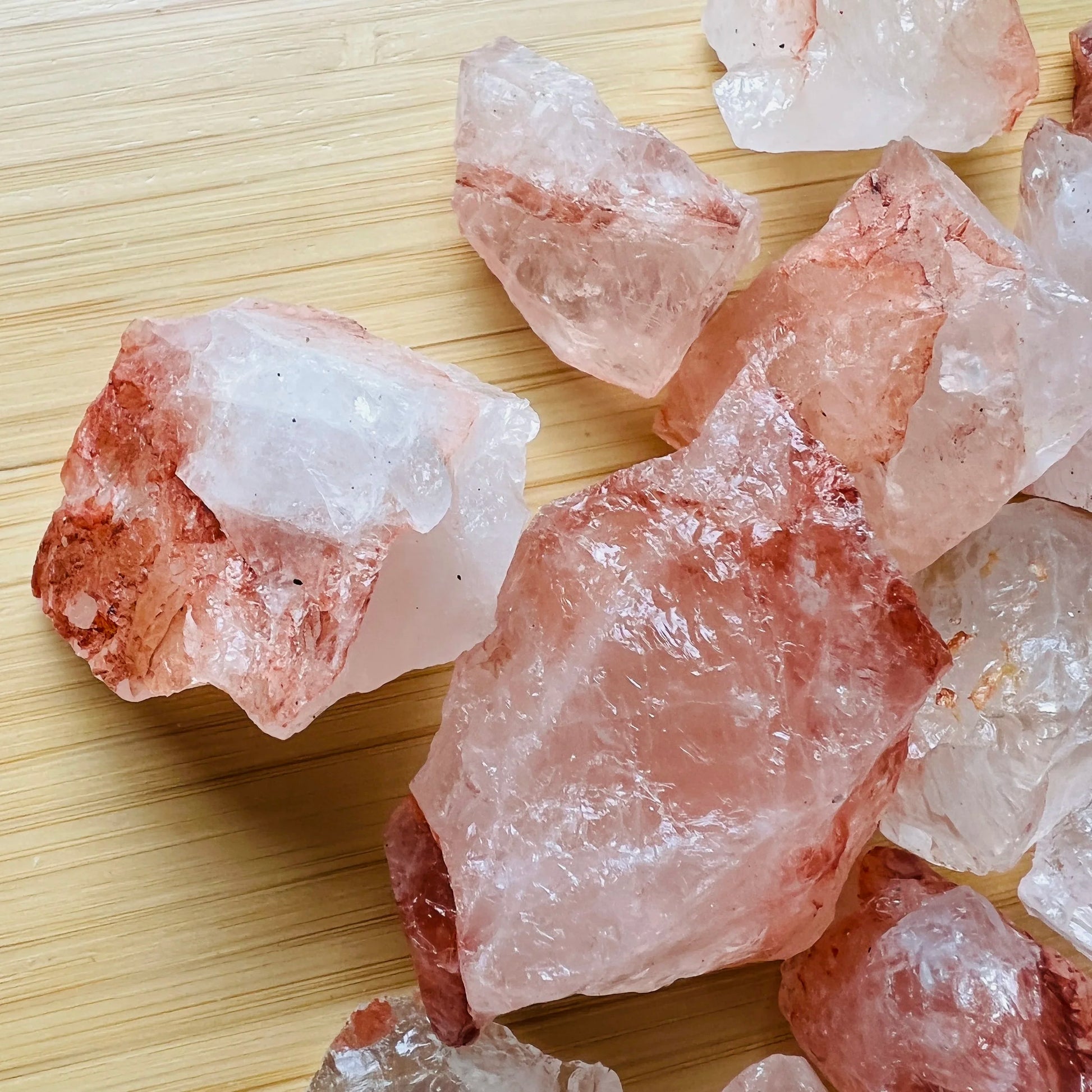 Texture-level view of red Fire Quartz raw stone, kept near for Grounding and Confidence, from Madagascar.