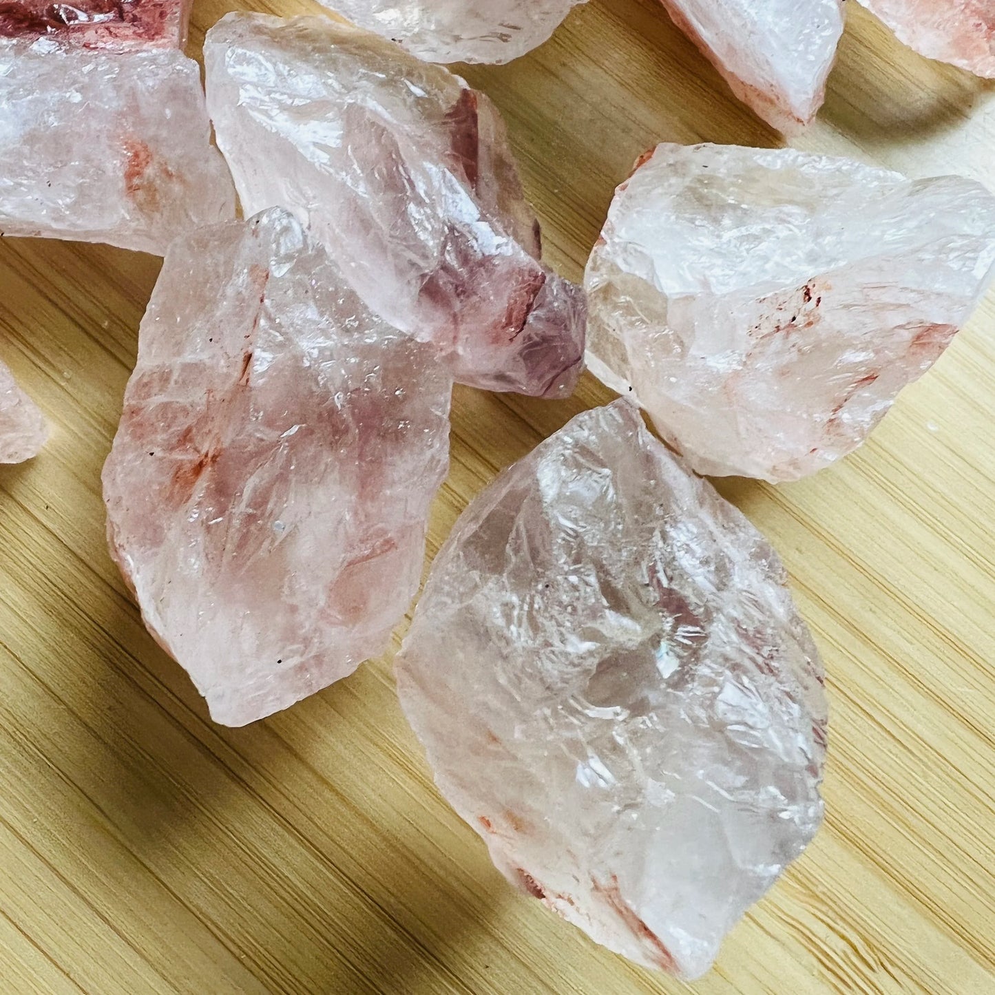 Top-side view of Fire Quartz raw stone, showing natural sheen.