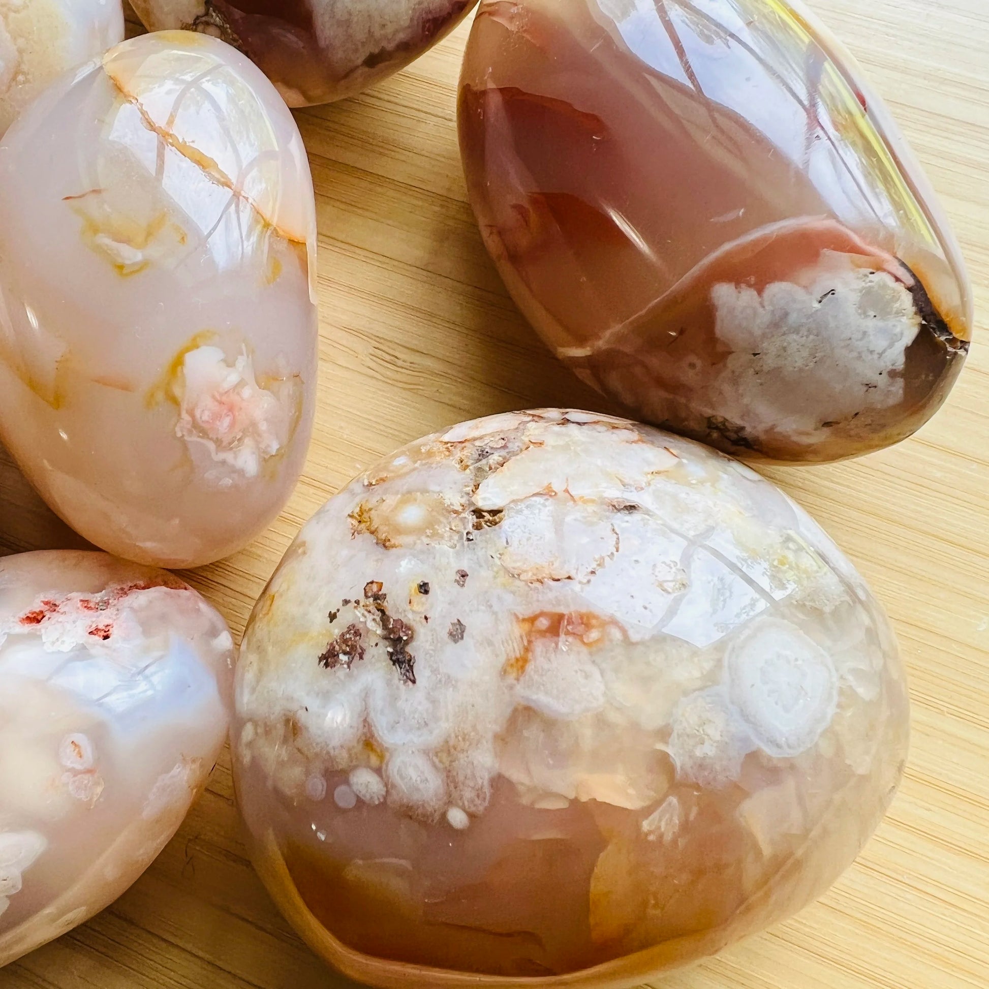 Sideways view of pink Flower Agate palm stone, from Madagascar.