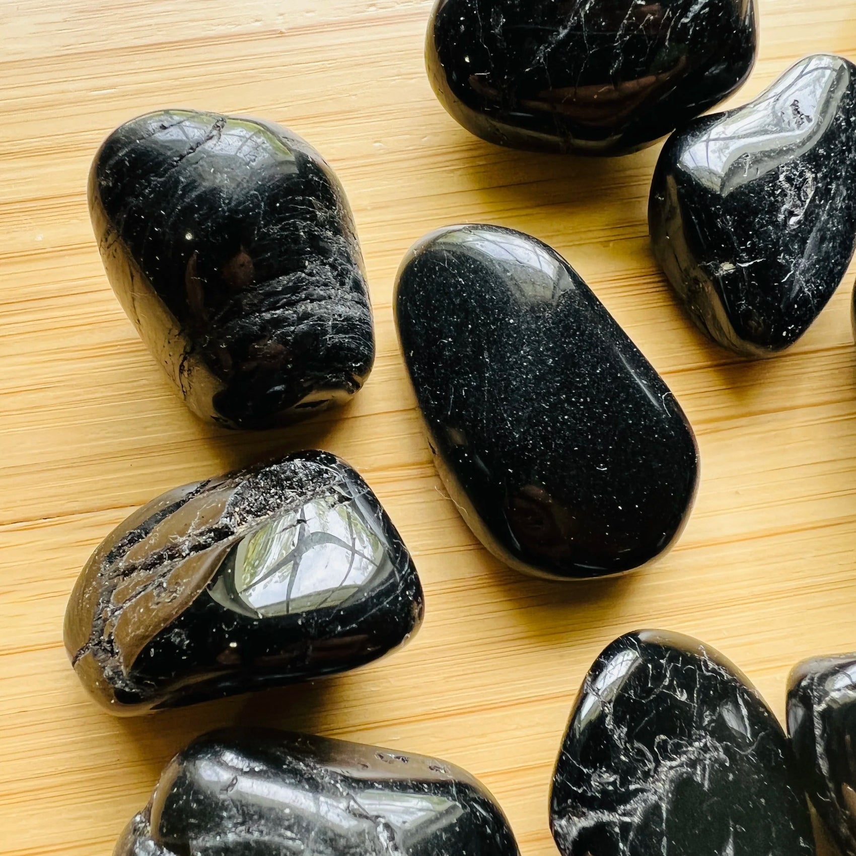 Black Tourmaline tumbled stone from Brazil with Black color, polished finish for mindful calm