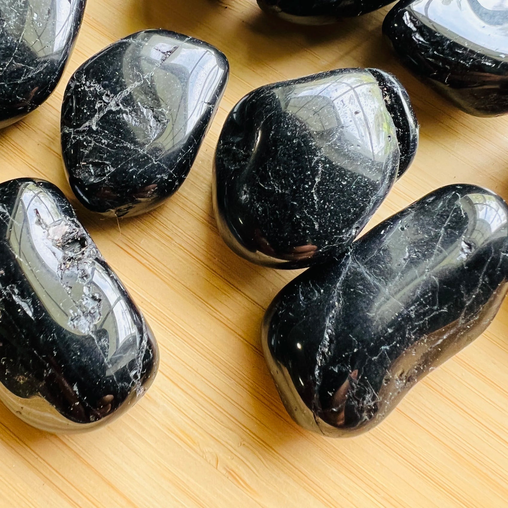 Handheld Black Tourmaline tumbled stone from Brazil for meditation, Stress Relief and Cleansing