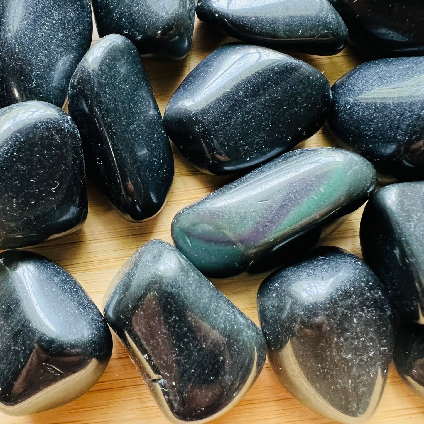 Full profile of Grade AA Rainbow Obsidian tumbled stone ready to ship from Beyond Bohemian