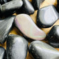 Full profile of Grade AA Rainbow Obsidian tumbled stone ready to ship from Beyond Bohemian