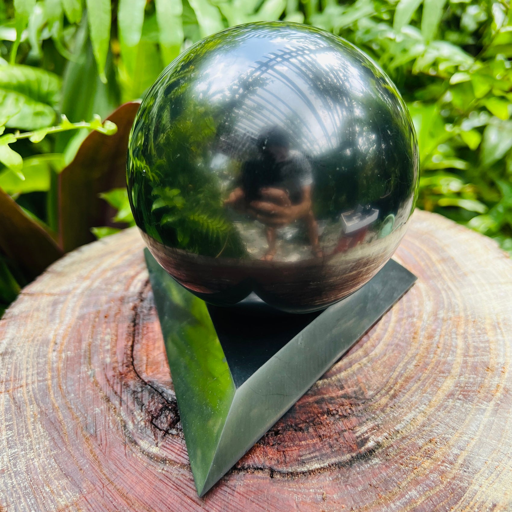 Tight crop of Shungite polished sphere, sourced from Russia.