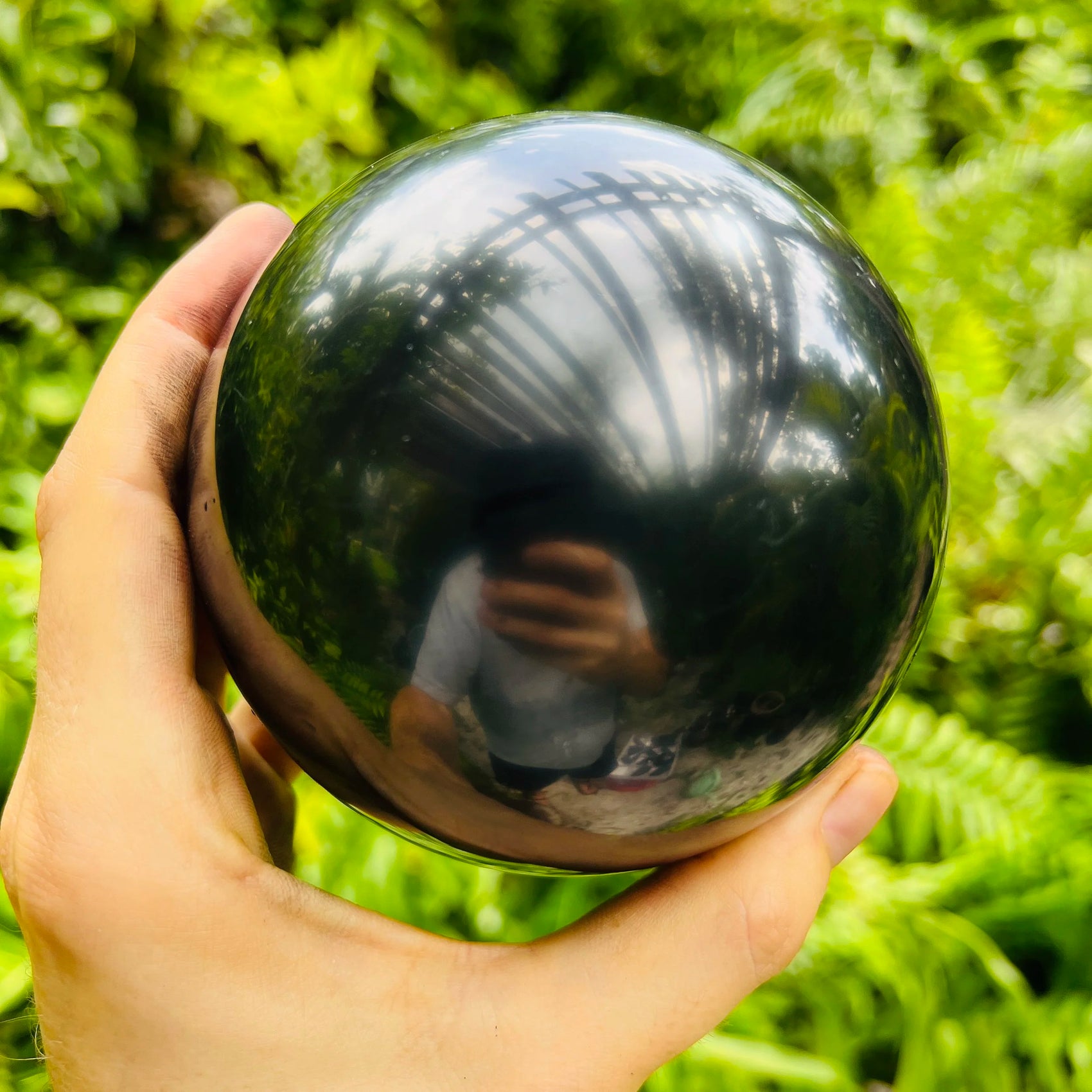 Reverse side of black Shungite polished sphere, sourced from Republic of Karélia, Russia.