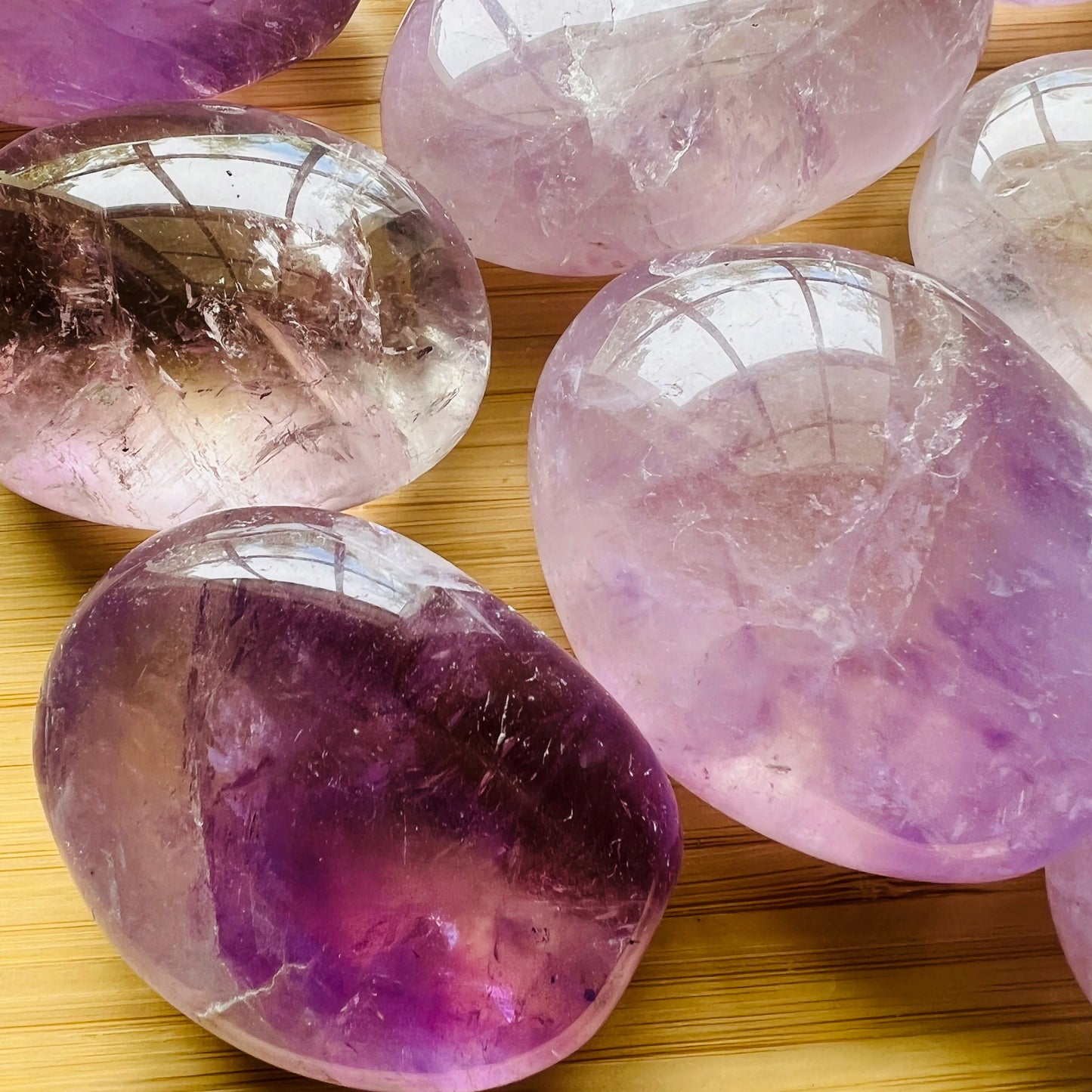 Bottom side of Amethyst palm stone, showing natural sheen.